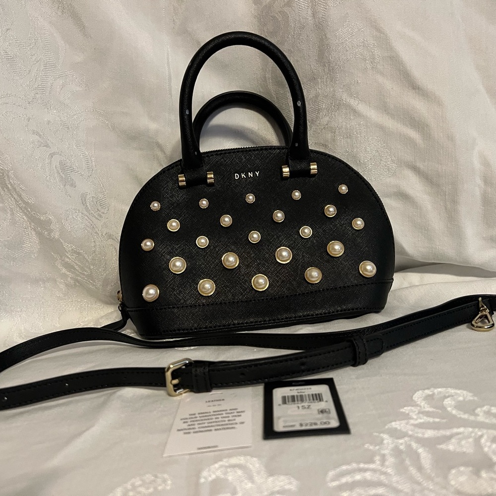 DKNY black leather satchel with shoulder strap and pearl and gold embellishments